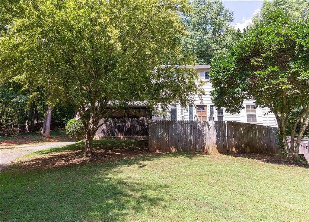 2.5 Acres of Residential Land with Home for Sale in Alpharetta, Georgia