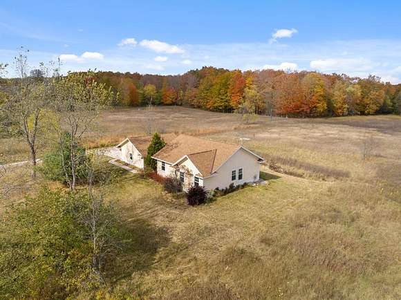 40 Acres of Land with Home for Sale in Pellston, Michigan