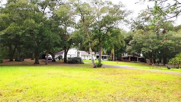 4.17 Acres of Residential Land with Home for Sale in Lake Helen, Florida