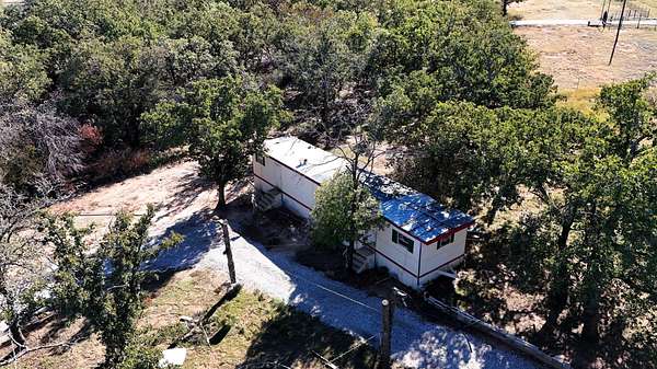 2 Acres of Land with Home for Sale in Bridgeport, Texas