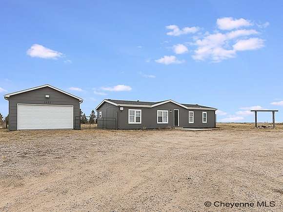 6.78 Acres of Land with Home for Sale in Burns, Wyoming