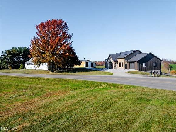 6.406 Acres of Land with Home for Auction in Sugarcreek, Ohio