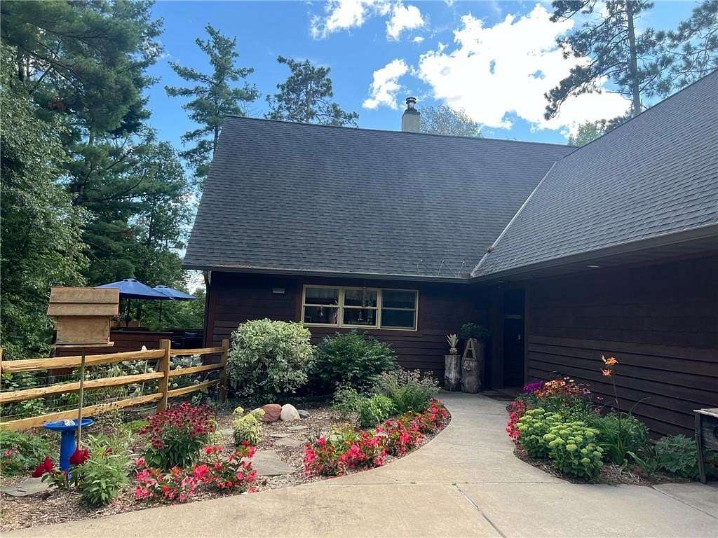 2.64 Acres of Residential Land with Home for Sale in Nisswa, Minnesota