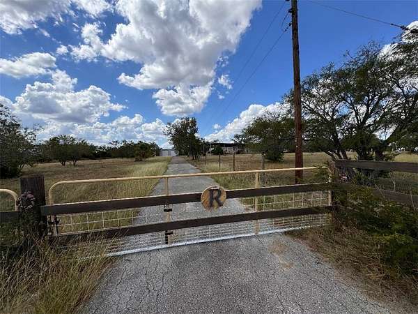 5 Acres of Residential Land with Home for Sale in George West, Texas
