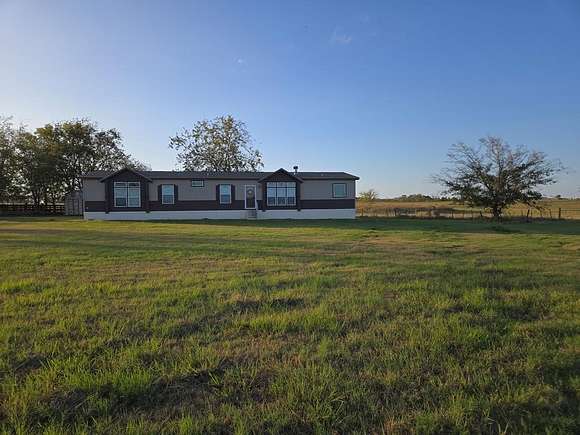 4.276 Acres of Residential Land with Home for Sale in Elkhart, Texas