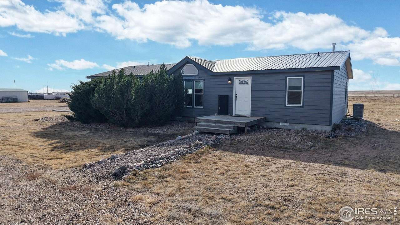 6.19 Acres of Land with Home for Sale in Carr, Colorado