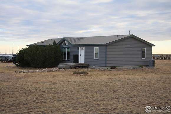 6.19 Acres of Land with Home for Sale in Carr, Colorado