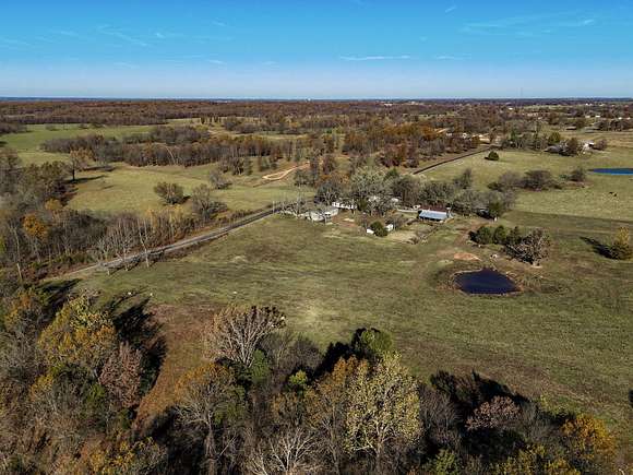 9.98 Acres of Residential Land with Home for Sale in Aurora, Missouri