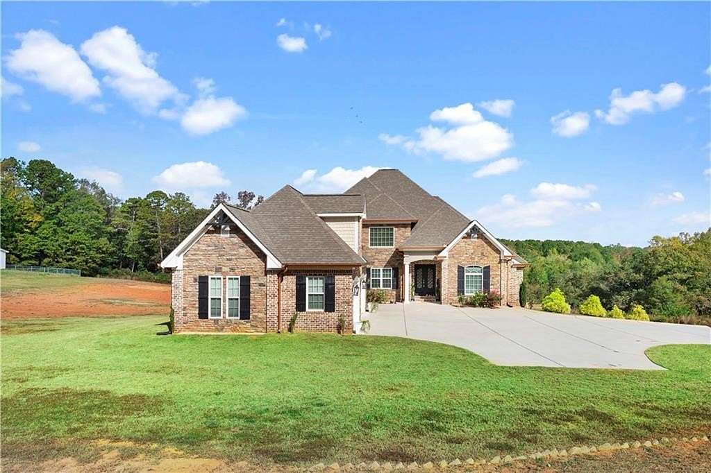 10.2 Acres of Land with Home for Sale in Commerce, Georgia