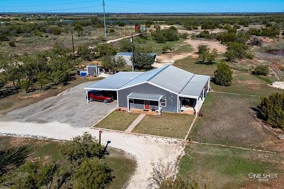 28.66 Acres of Agricultural Land with Home for Sale in Merkel, Texas