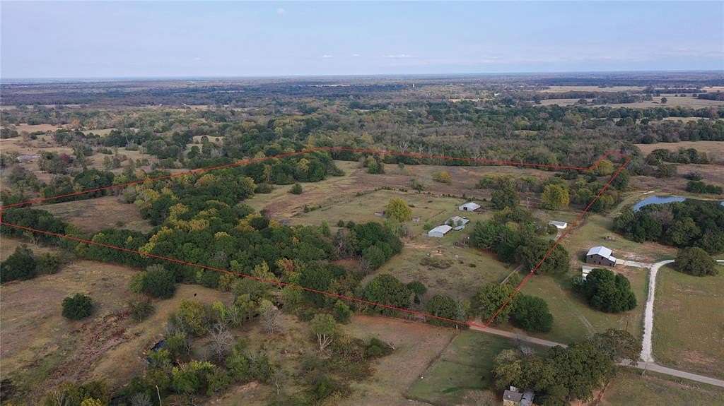 53.85 Acres of Land with Home for Sale in Honey Grove, Texas