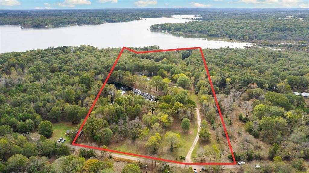 16.86 Acres of Recreational Land with Home for Sale in Scroggins, Texas