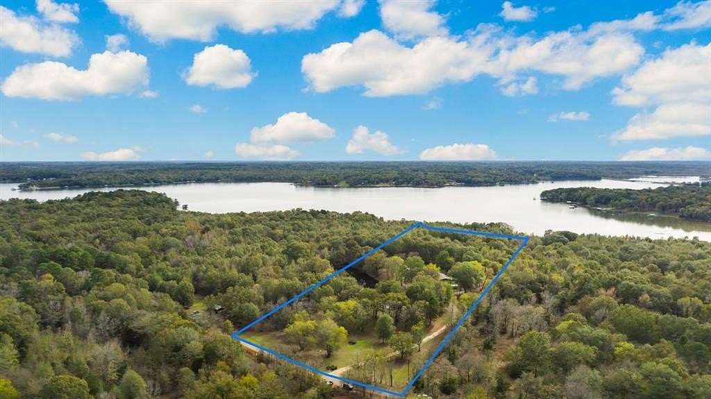 16 Acres of Recreational Land with Home for Sale in Scroggins, Texas