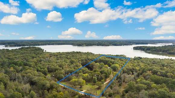 16 Acres of Recreational Land with Home for Sale in Scroggins, Texas