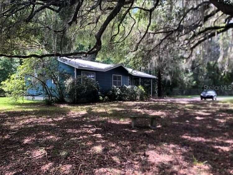 2.94 Acres of Residential Land with Home for Sale in Micanopy, Florida