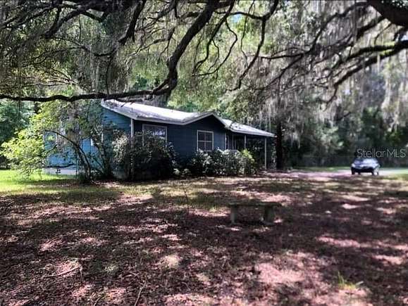 2.94 Acres of Residential Land with Home for Sale in Micanopy, Florida