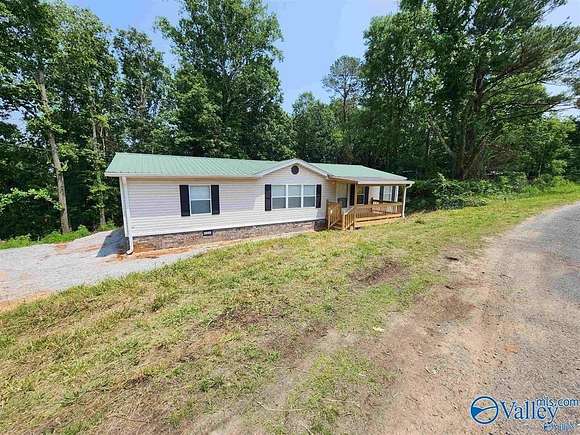 5.1 Acres of Residential Land with Home for Sale in Union Grove, Alabama