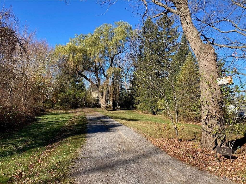 3.31 Acres of Residential Land with Home for Auction in Marilla, New York