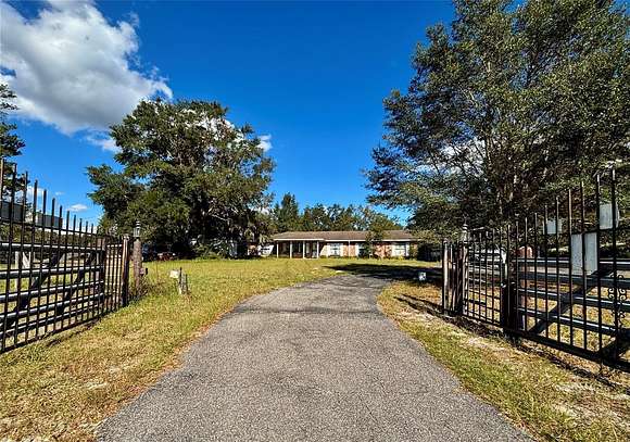 49.12 Acres of Land with Home for Sale in Chiefland, Florida