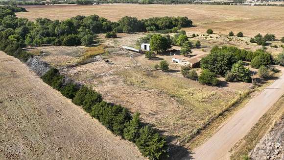 7.87 Acres of Land with Home for Auction in Enid, Oklahoma