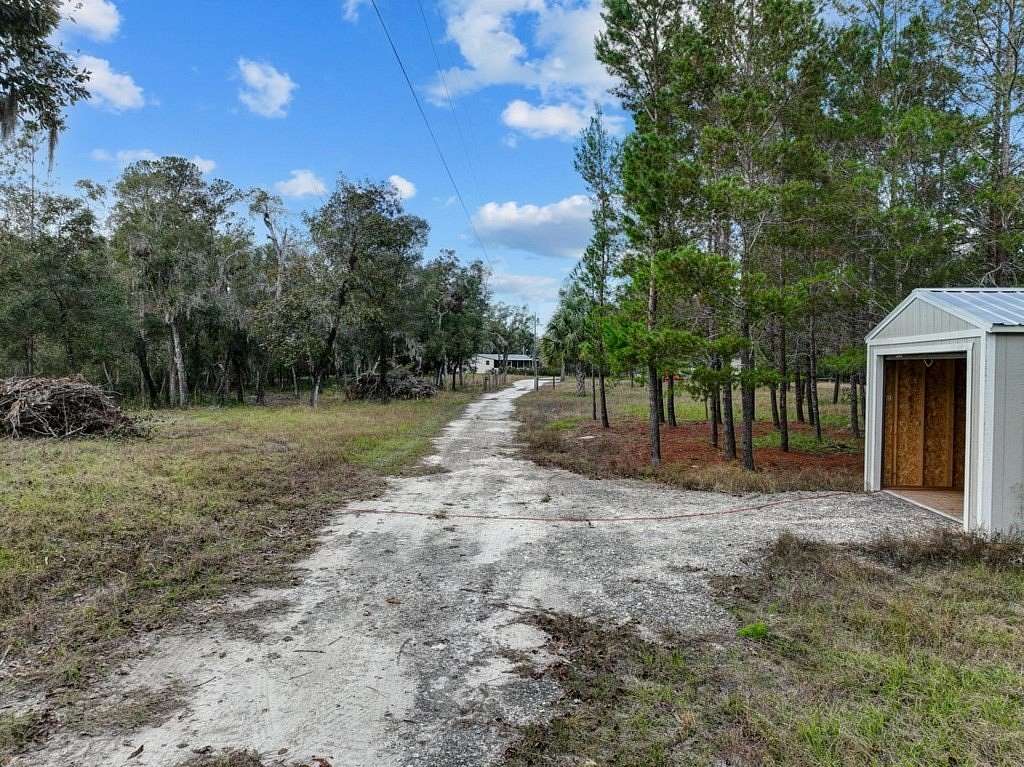 23.63 Acres of Recreational Land with Home for Sale in Old Town, Florida