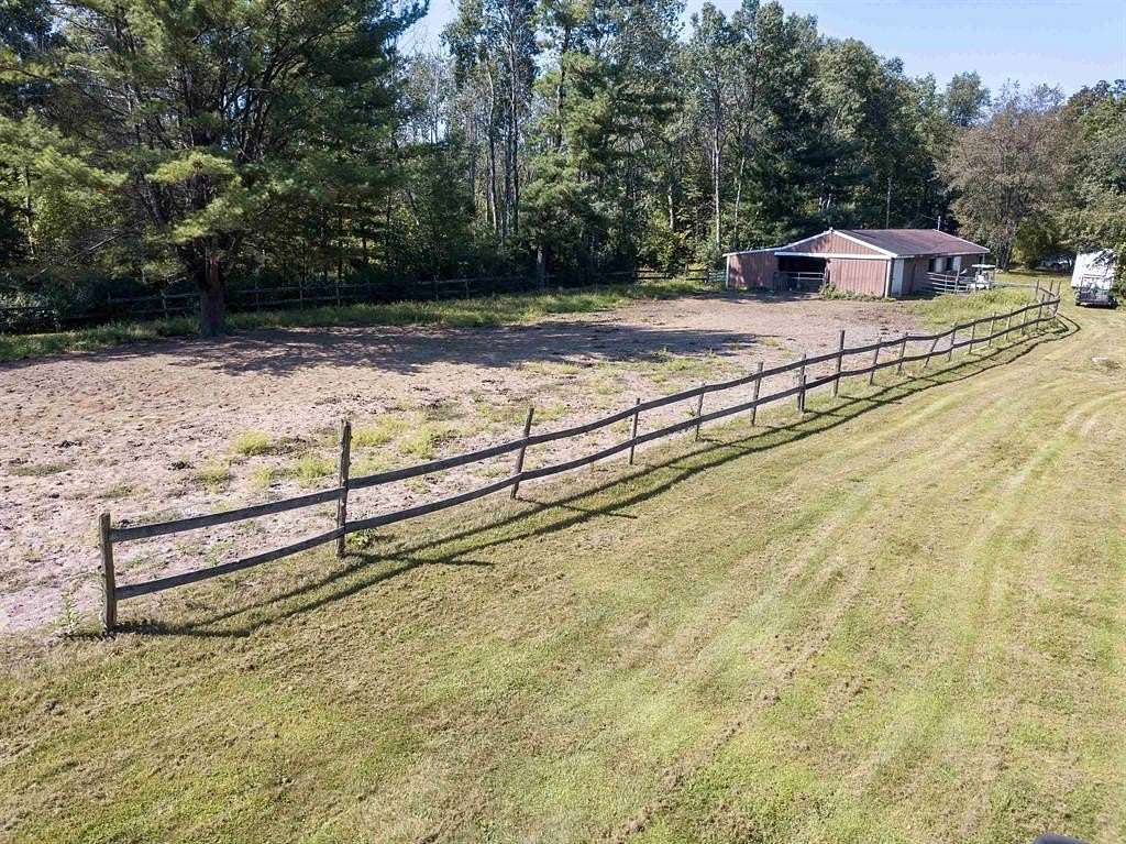 15 Acres of Land with Home for Sale in Sanford, Michigan