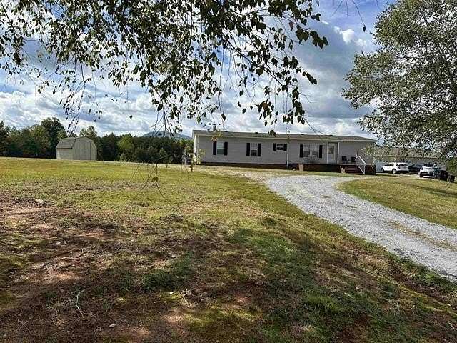 21.24 Acres of Land with Home for Sale in Landrum, South Carolina