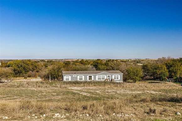 3.926 Acres of Residential Land with Home for Sale in Rhome, Texas