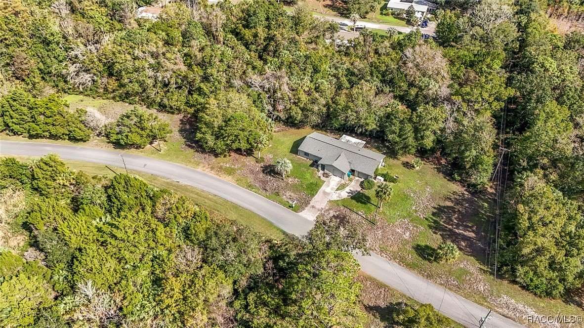 2.6 Acres of Residential Land with Home for Sale in Crystal River, Florida