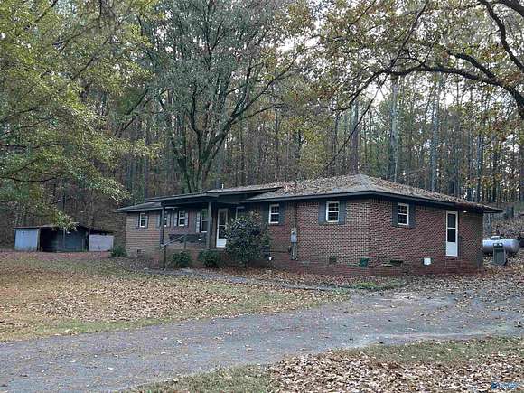 7.3 Acres of Residential Land with Home for Sale in Hokes Bluff, Alabama