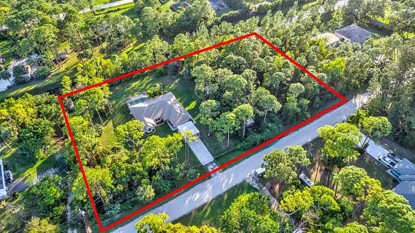 2.58 Acres of Residential Land with Home for Sale in The Acreage, Florida