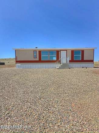 5.85 Acres of Residential Land with Home for Sale in Seligman, Arizona