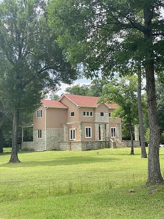 5.11 Acres of Land with Home for Sale in Roland, Arkansas