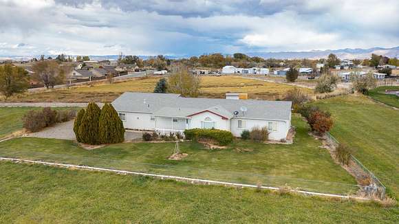 3.2 Acres of Residential Land with Home for Sale in Fruita, Colorado