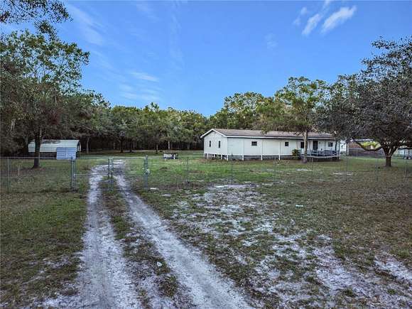 4.95 Acres of Residential Land with Home for Sale in St. Cloud, Florida