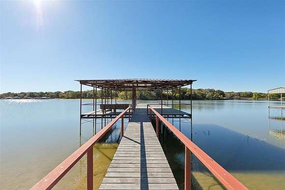 2.5 Acres of Residential Land with Home for Sale in Quinlan, Texas