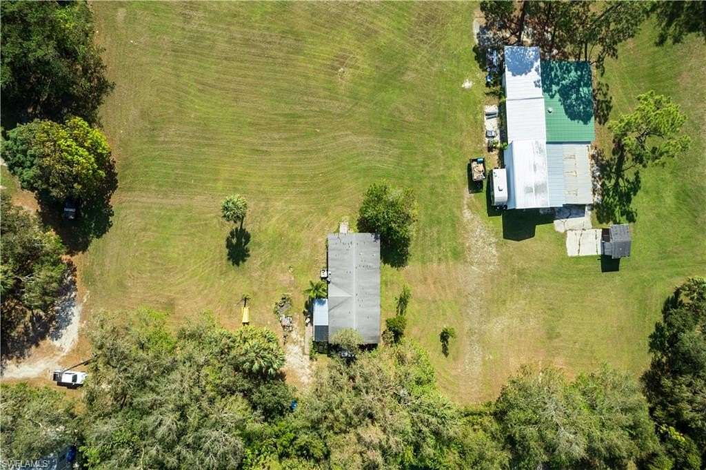 3.6 Acres of Residential Land with Home for Sale in Bonita Springs, Florida