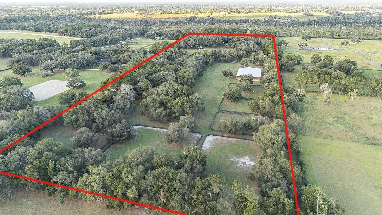 36.93 Acres of Agricultural Land with Home for Sale in Morriston, Florida