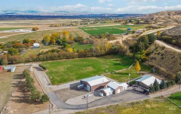 4.999 Acres of Residential Land with Home for Sale in Emmett, Idaho