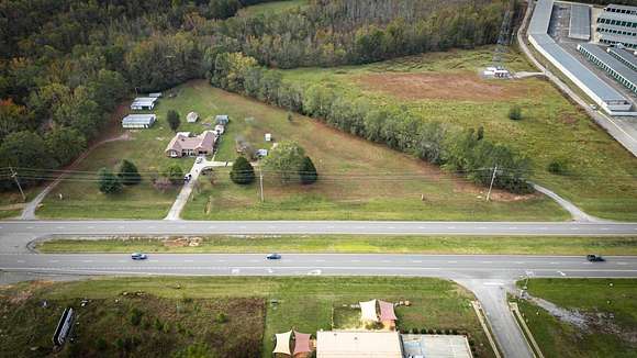 7 Acres of Commercial Land for Auction in Owens Cross Roads, Alabama