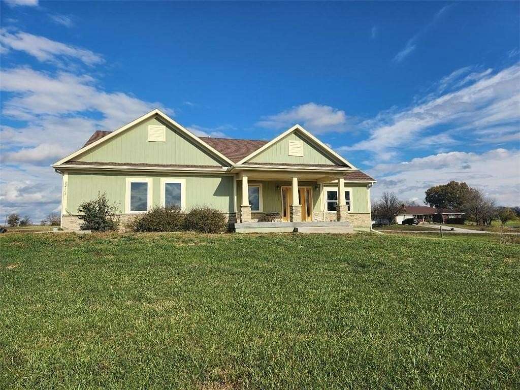 8.6 Acres of Residential Land with Home for Sale in Harrisonville, Missouri