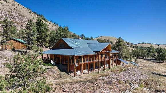 80 Acres of Recreational Land with Home for Sale in Guffey, Colorado