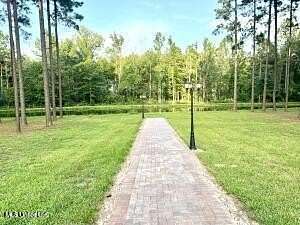 9 Acres of Residential Land with Home for Sale in Brandon, Mississippi