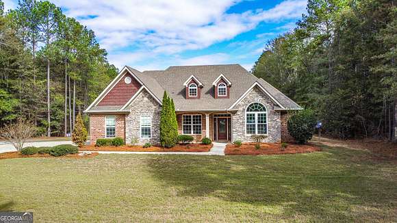 9.62 Acres of Land with Home for Sale in Hampton, Georgia