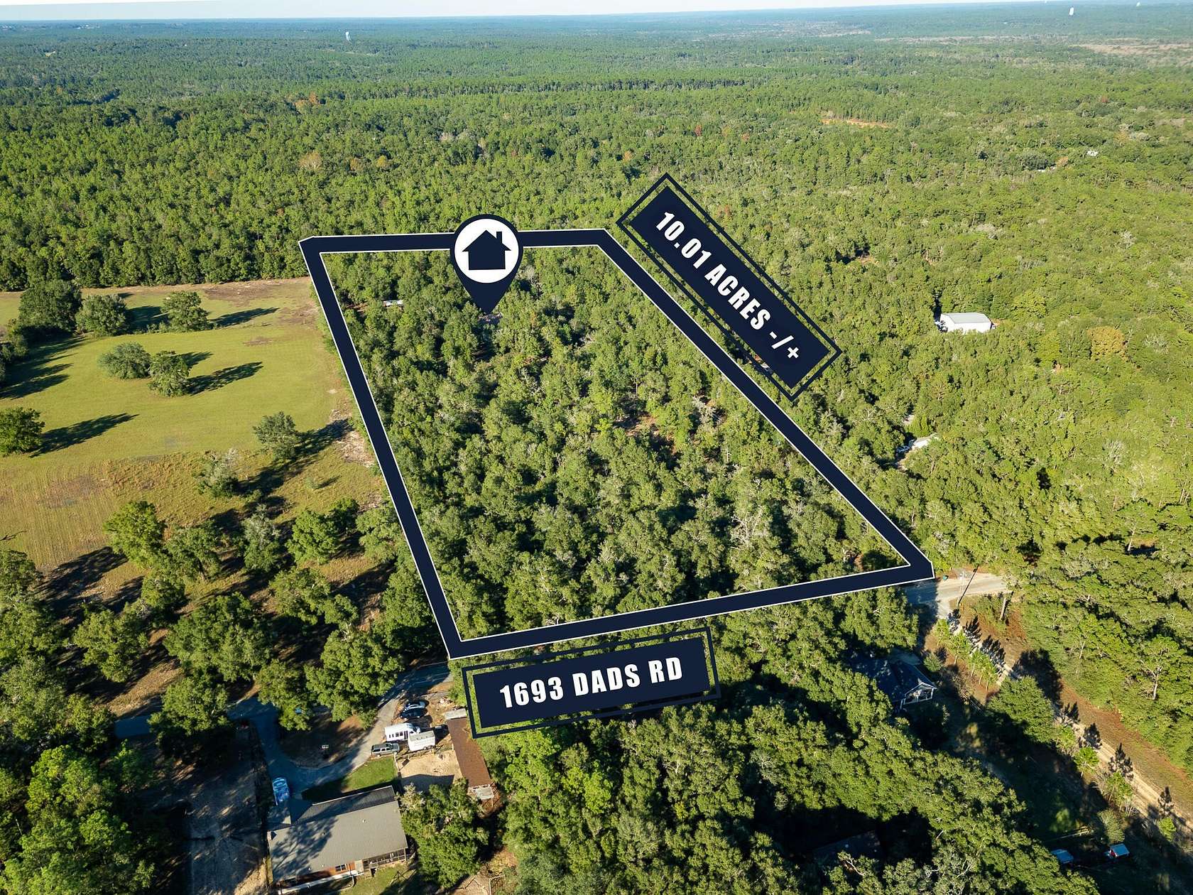 10.01 Acres of Land with Home for Sale in Baker, Florida