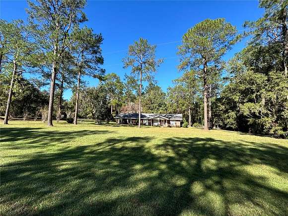 5 Acres of Residential Land with Home for Sale in Gainesville, Florida