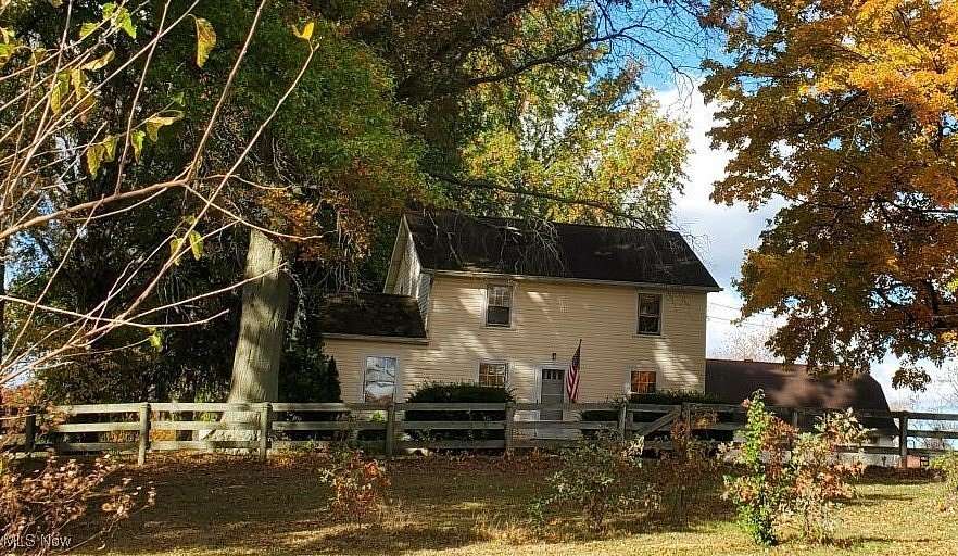 6.971 Acres of Land with Home for Sale in Rittman, Ohio