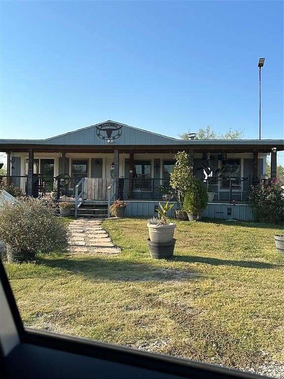 10.01 Acres of Land with Home for Sale in Wortham, Texas