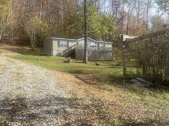 5.63 Acres of Residential Land with Home for Sale in Riceville, Tennessee