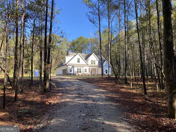 6.4 Acres of Residential Land with Home for Sale in Forsyth, Georgia